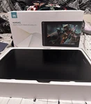 Huion Kamvas Graphics Tablet With Glove, Stylus, Stand, Multiple Accessories. Fixed Price $156.00.