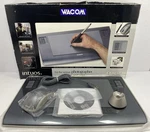 Wacom Intuos PTZ-631W 6X11 Graphics Tablet W/ Mouse, Holder & Cd ***no Pen***. Fixed Price $39.99.