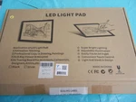 Tikteck, A4 Ultra Thin Portable Led Tracing Light Box, Black, Open. Fixed Price $18.00.