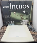 Wacom Intuos Intelligent Graphics Tablet System W/ Pen 12" X GD-1212-U. Fixed Price $103.99.