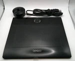 Wacom Bamboo Graphics Tablet Model MTE-450A Black MTE-450/K(B). Fixed Price $9.00.