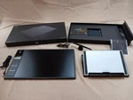Huion WH1409 13.8 Inch X 8.6 8192 Wireless Graphic Tablet With Tilt Stand. Fixed Price $75.00.
